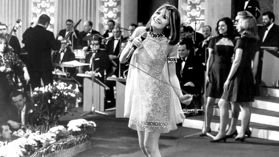 sandieshaw105_v-contentgross