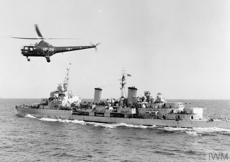 HMS BELFAST DURING THE KOREAN WAR 1950-1952 (A 31985) The Korean War 1950-1952: An American S.51 helicopter flies over HMS BELFAST in the Yellow Sea, 1951. Copyright: © IWM. Original Source: http://www.iwm.org.uk/collections/item/object/205187744